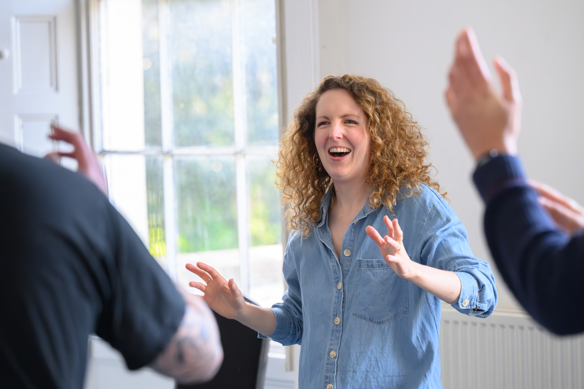A facilitator delivering a workshop at Bristol Improv Theatre