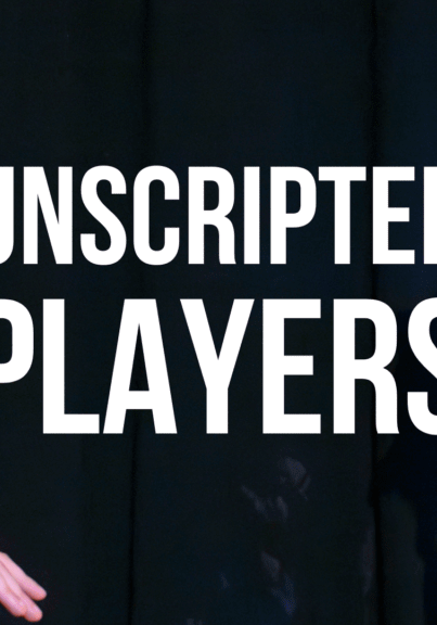 Two improv performers facing each other, with text in between them which reads "UNSCRIPTED PLAYERS"